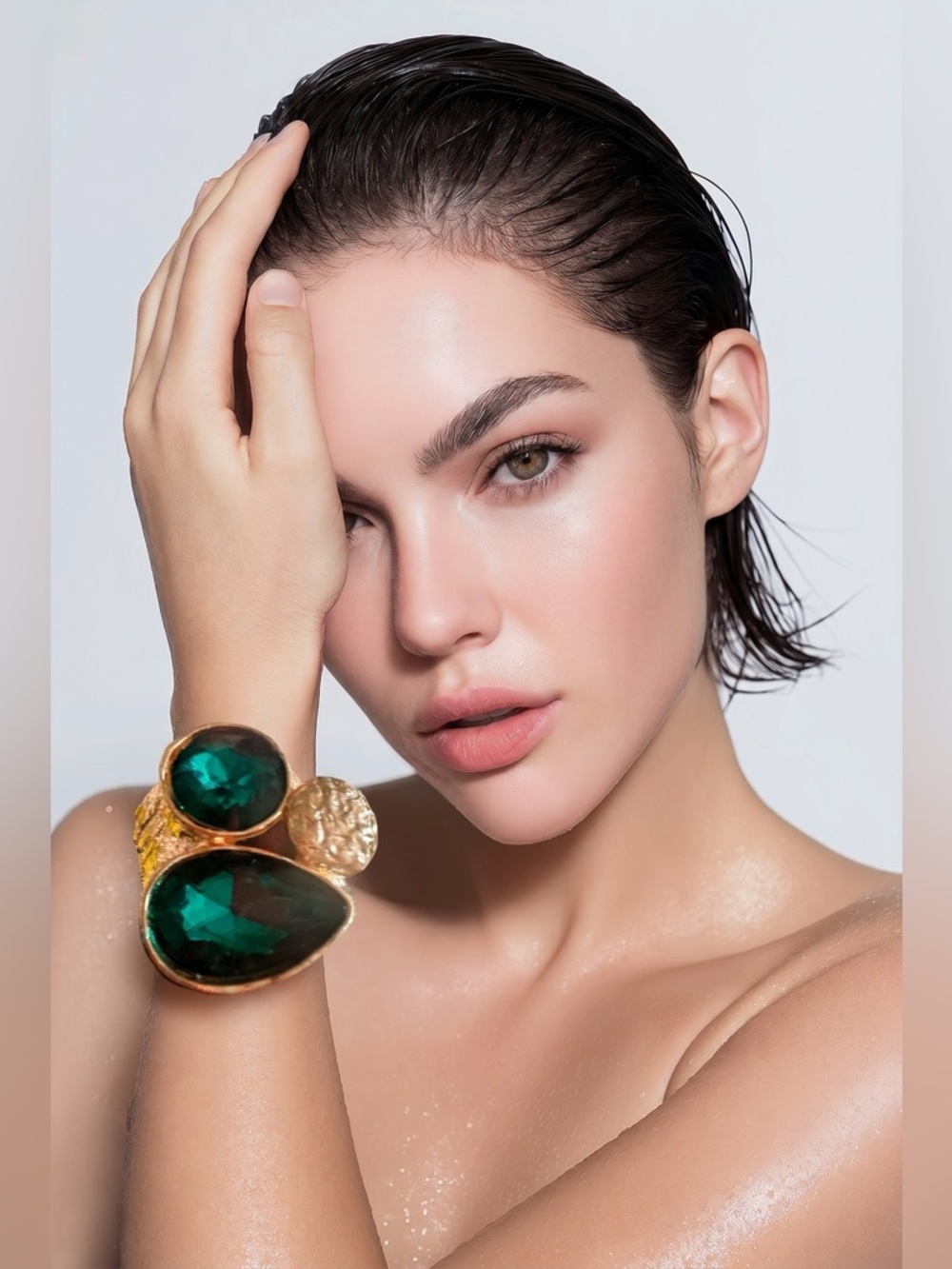Statement cuff bracelet with gorgeous large emerald green glass stones